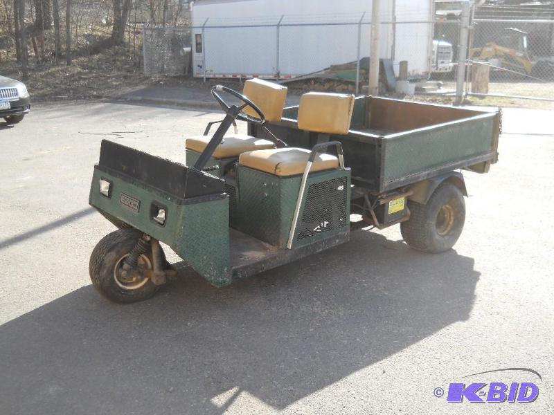 lot 4 image: EZ-GO Utility Vehicle with Box. Powered by Onan 20HP Motor.