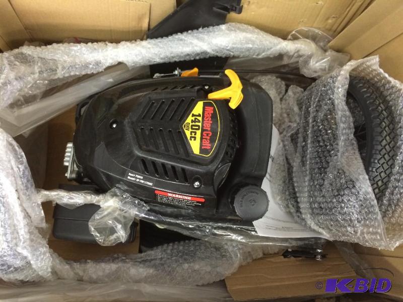 Brand New 140 cc master craft lawn mower complete in the box