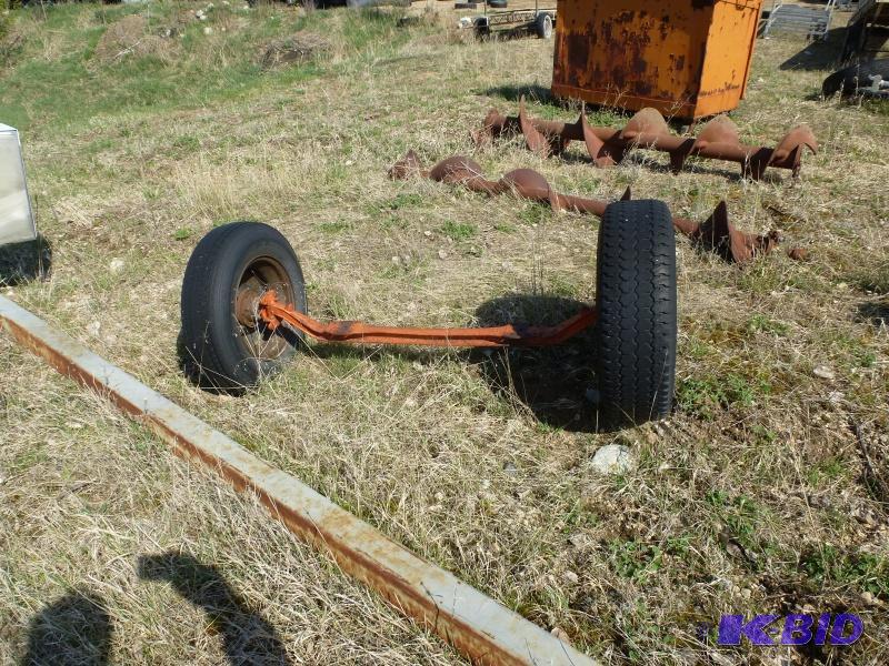 Steel axle with wheels Orange trailer axle....