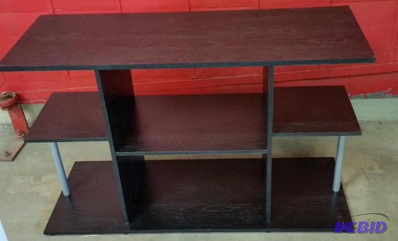 lot 27 image: Mainstays Black multi shelf Entertainment Center.  New out of Box Assembled