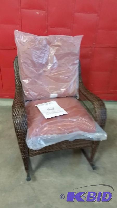 lot 41 image: Azalea Ridge Wicker  Rocking Chair.  New out of Box.  We assembled.  Very Nice.  Burnt Orange Seat Cushion