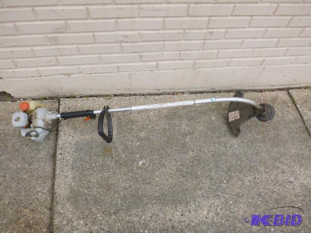 lot 156 image: Echo Weed Whip GT-2000 Has compression....