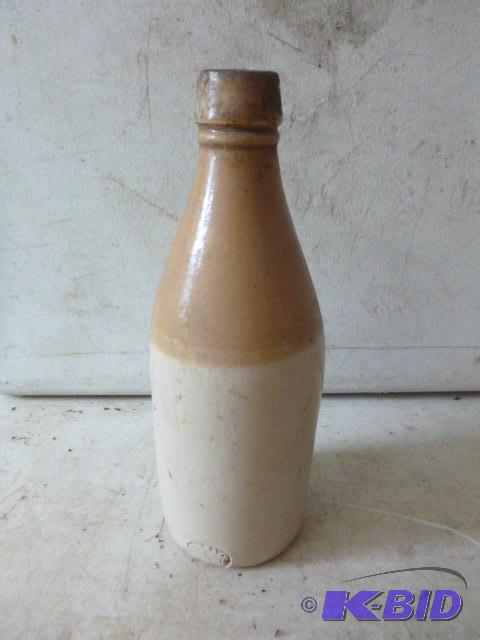 lot 189 image: Clay Glazed Bottle 8 12" high, has a ch...