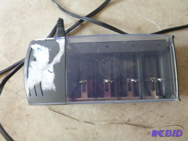 lot 42 image: RayOVac Universal Battery Charger...
