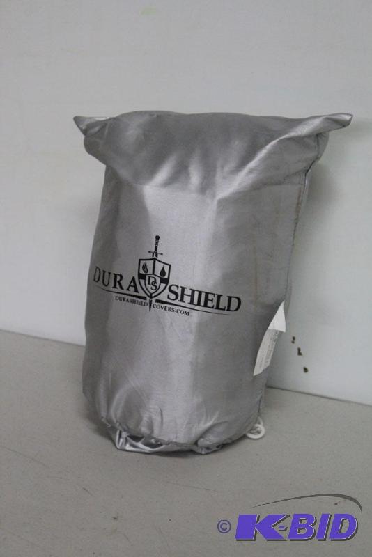 lot 63 image: DuraShield EZ Pack travel motorcycle cover. N...