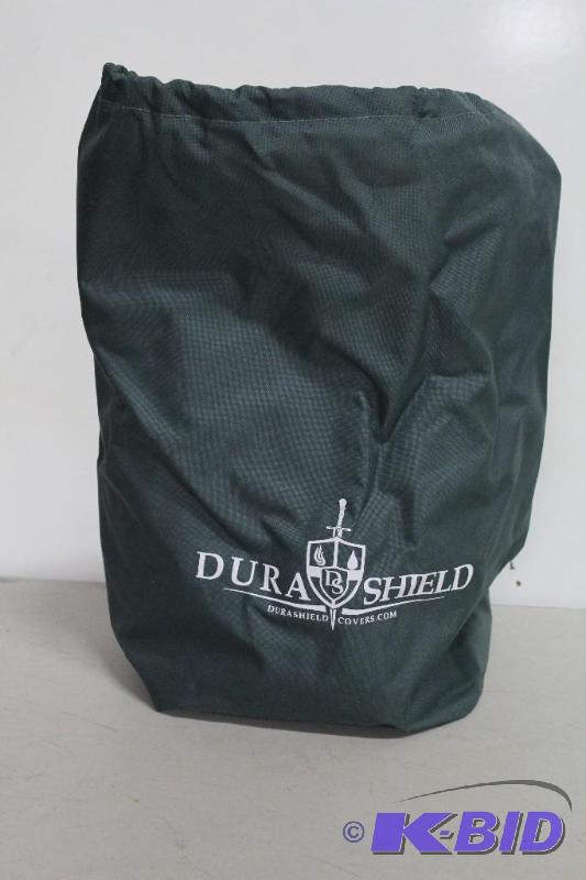 lot 68 image: DuraShield Pontoon boat cover. Includes strap...