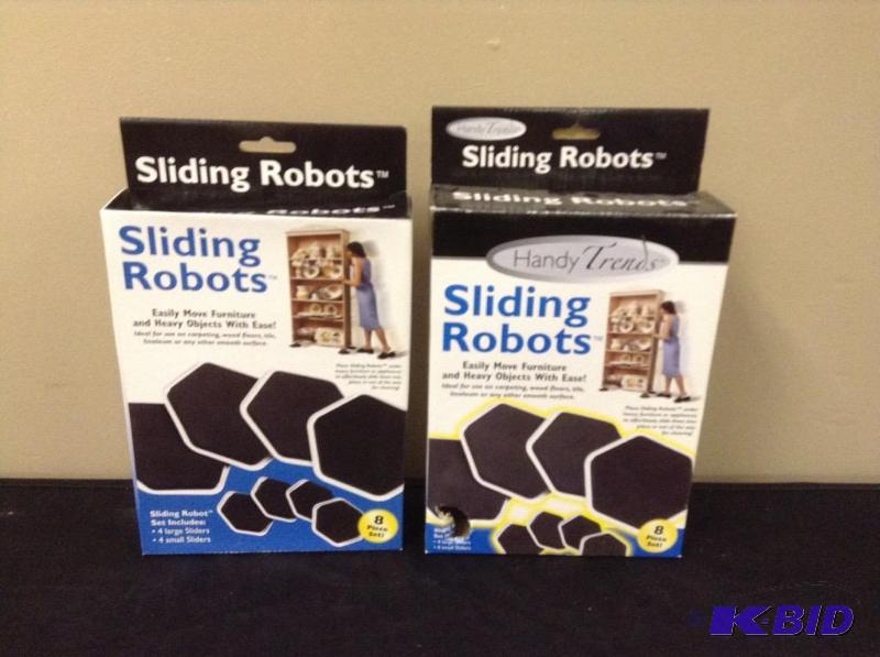 lot 11 image: 2 Boxes Handy Trends Sliding Robots