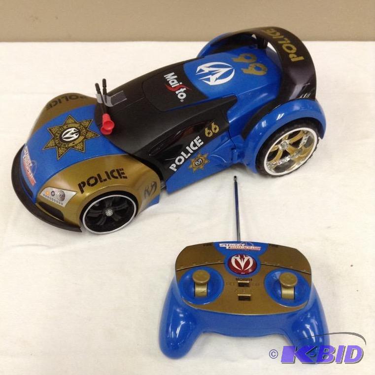 lot 4 image: Maisto Police 66 Street Troopers Remote Control Car