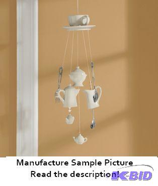 lot 11 image: Teacup Windchime - A delight for the eyes as ...