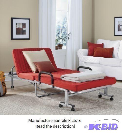 lot 115 image: Red and Silver Folding Bed - Unfold the metal...