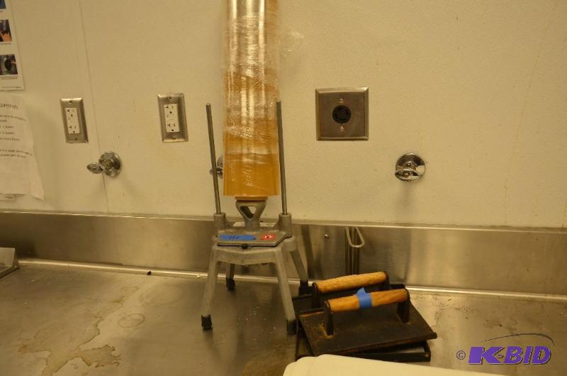 lot 111 image: Stretch Wrap Dispenser on Stand and metal pla...