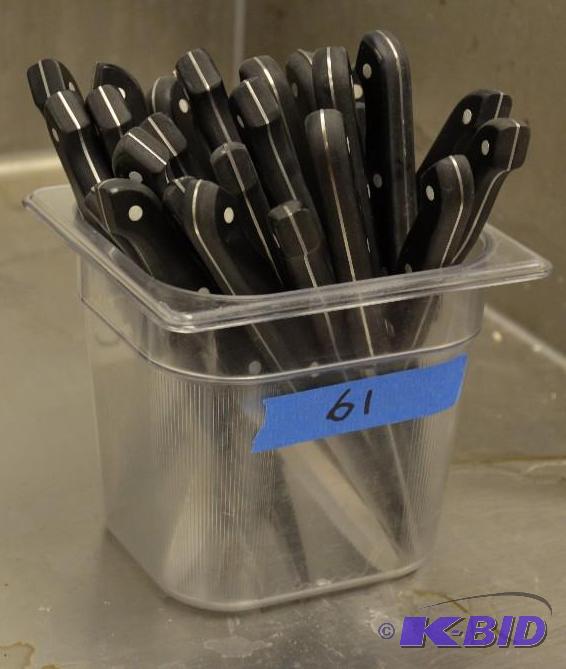 lot 61 image: Lot of 21 steak knives with black handles...