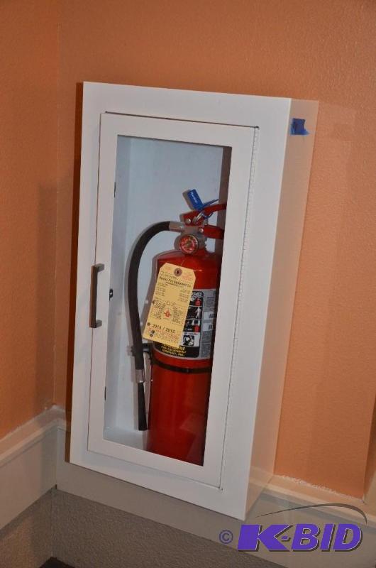 lot 79 image: Fire Extinguisher in Box Bring tools for remo...