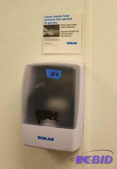 lot 89 image: Eco Lab Soap Dispenser. Bring tools to remove...
