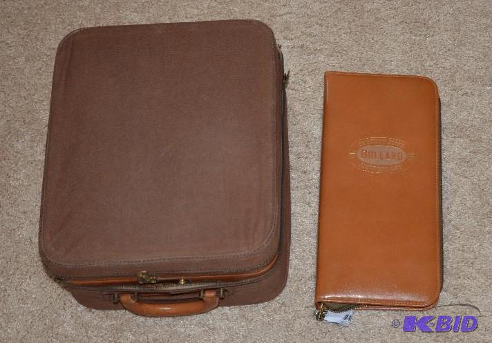 lot 142 image: Leather 3 ring zippered case reads 75th Anniv...