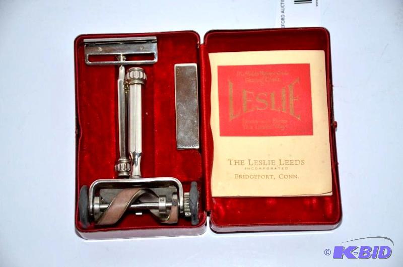 lot 161 image: Like new LESLIE razor with original metal cas...