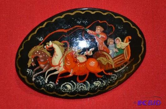 lot 206 image: Vintage Laquer Pin depicting sleigh with hors...