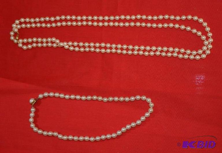 lot 210 image: 2 strands of pearls, single strand and double...