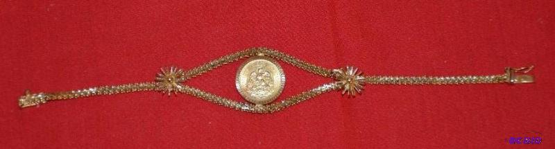 lot 219 image: 18 K Gold heavy necklace with coin in center....