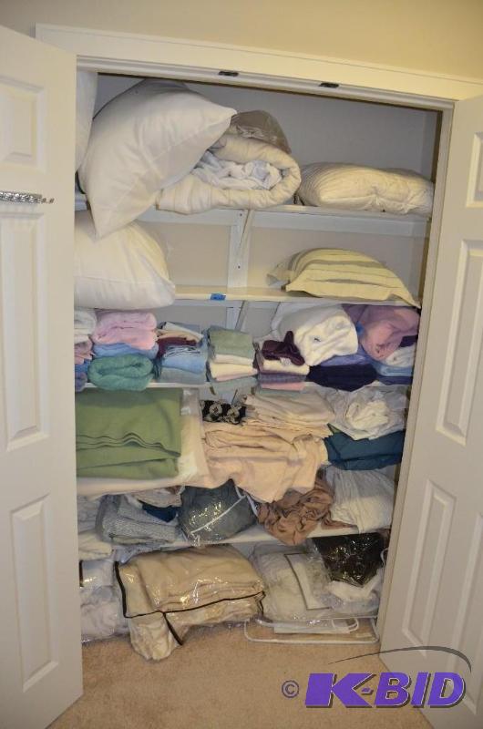 lot 264 image: Complete closet of towels, decorative pillows...
