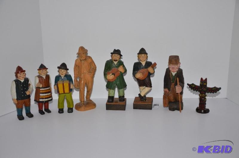lot 40 image: Hand carved wood European figurines, tallest ...
