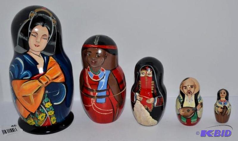 lot 46 image: Nested wooden dolls. the tallest is 7" t...
