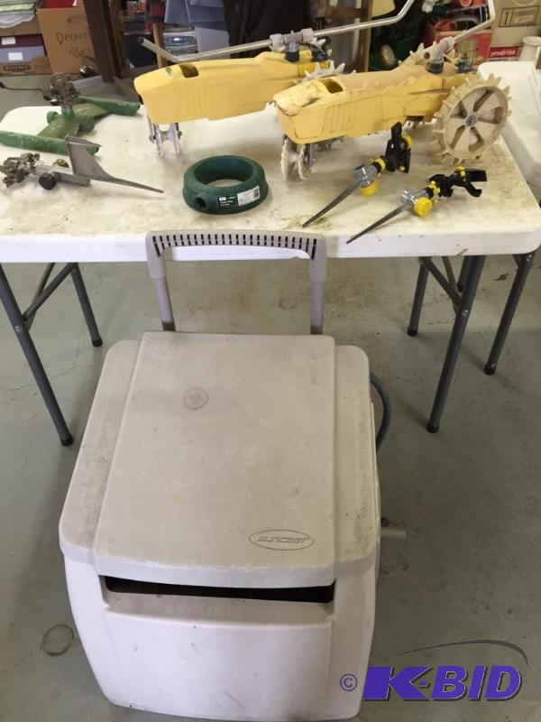 lot 46 image: Garden Hose Reel and Sprinklers