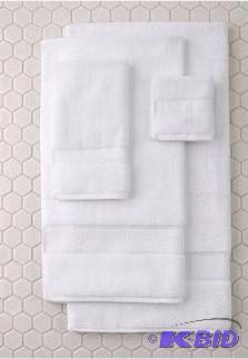 lot 35 image: Better Homes and Gardens 2 Plush White Bath Towels.