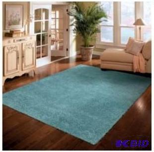 lot 46 image: Solid Light Gray Shag Rectangular Rug.  Size 59 x 72  Appears New not used.