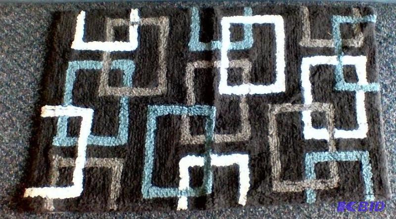 lot 48 image: Studio by JCPenney.  Chocolate Brown Cotton Washable Rug.  Size 21 x 34.  Appears unused.