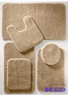 lot 53 image: Royal Velvet Plush Bath Rug.  Camel Color.  Appears unused.  No Tags.  Size 24 x 39