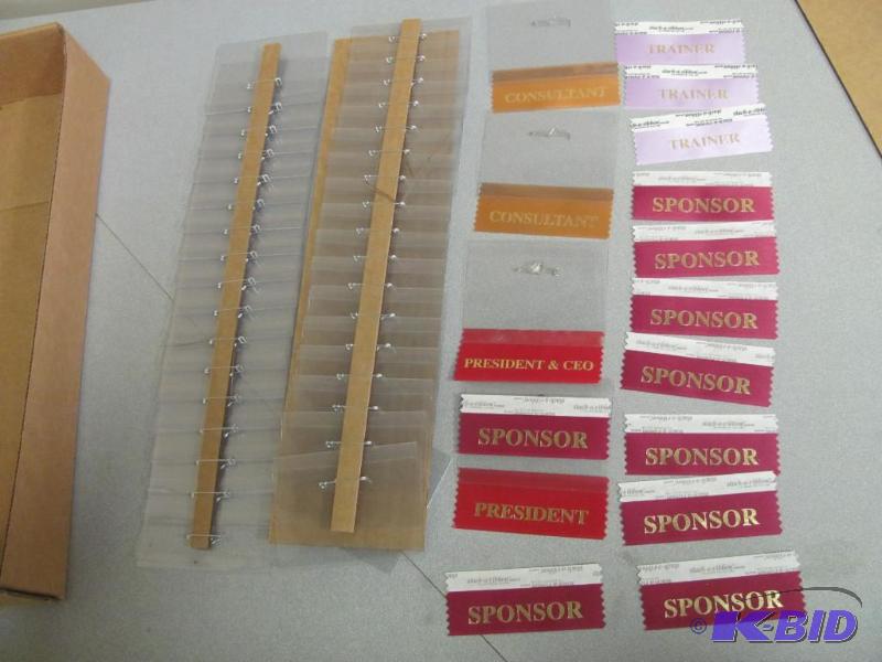 lot 140 image: Approximately 40 NEW (in box) Plastic Name Ta...