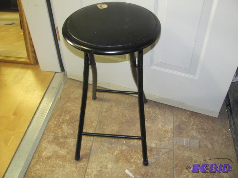lot 153 image: Black Folding Stool. Folds almost flat for ea...