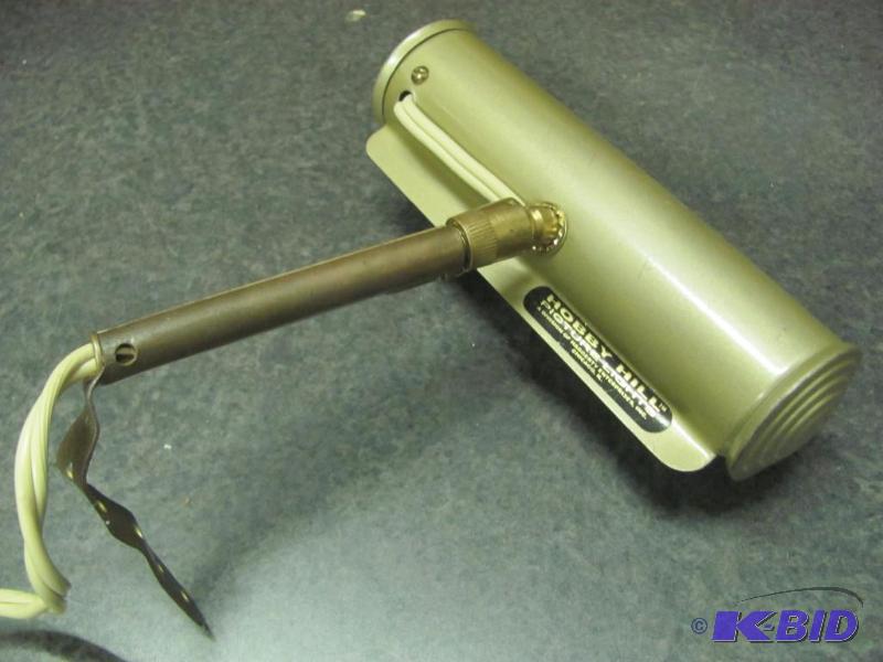 lot 53 image: This 6.5" Electric Artwork Light is used...