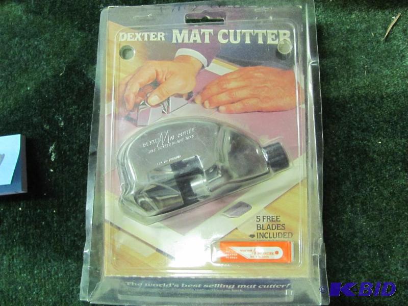 lot 59 image: DEXTER Mat Cutter (in original packaging). Lo...
