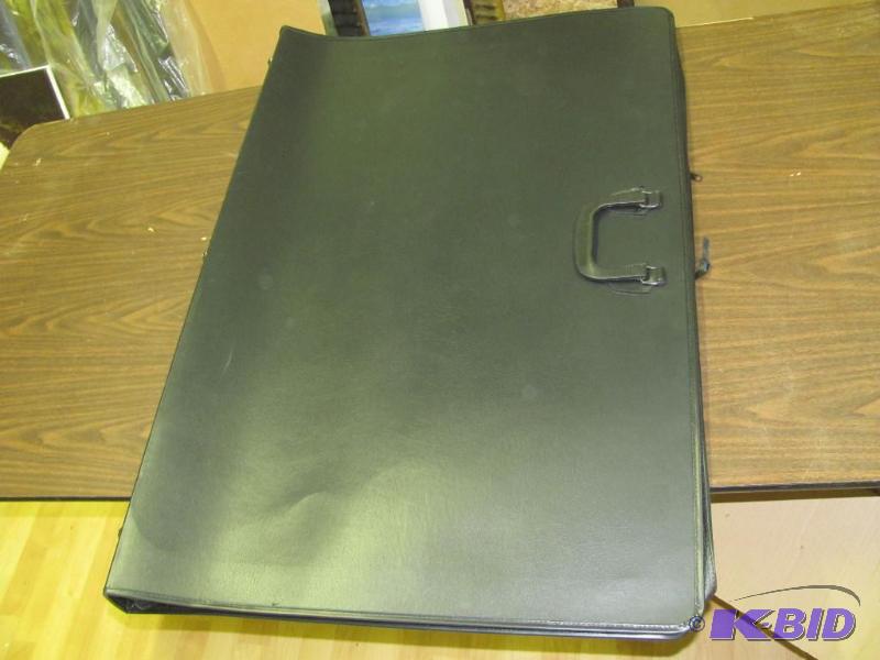lot 67 image: NEW (in factory plastic) Zippered ArtworkDoc...