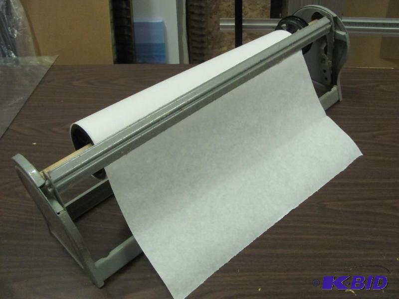 lot 86 image: Paper Roll DispenserCutter. Can hold a roll ...