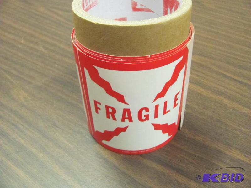 lot 90 image: Roll of &quotFRAGILE" Stickers from ULI...