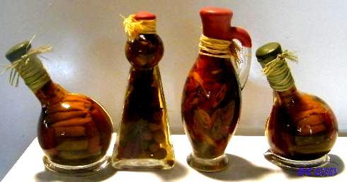 lot 166 image: Lot of 4 Glass Top Encased Decorative Bottled...