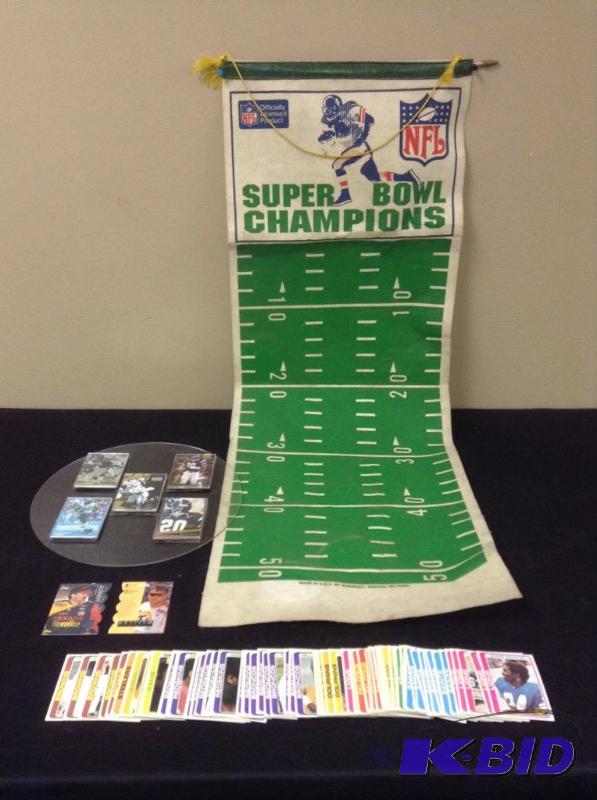 Assorted Trading Cards and Football Banner