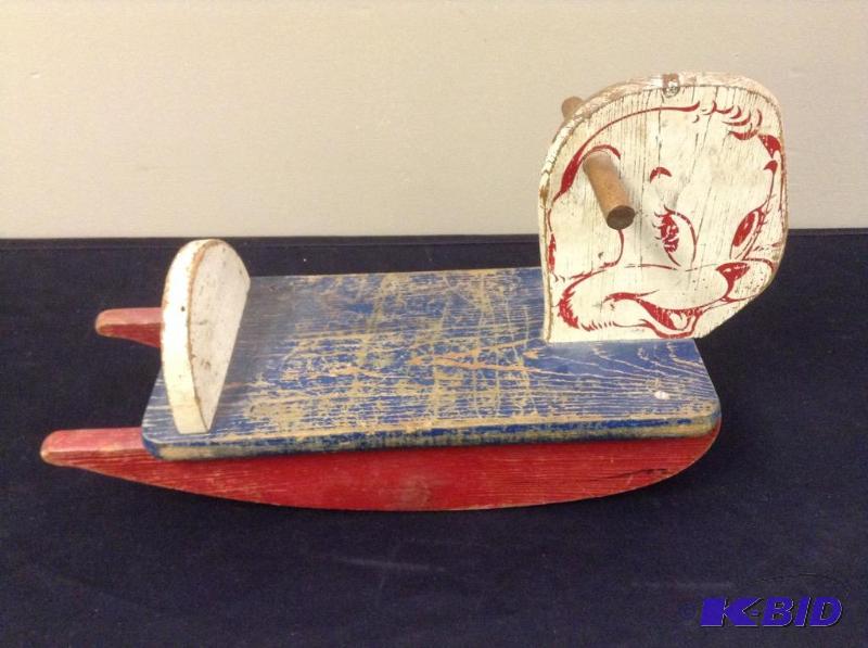lot 101 image: Vintage baby wood rocker dog