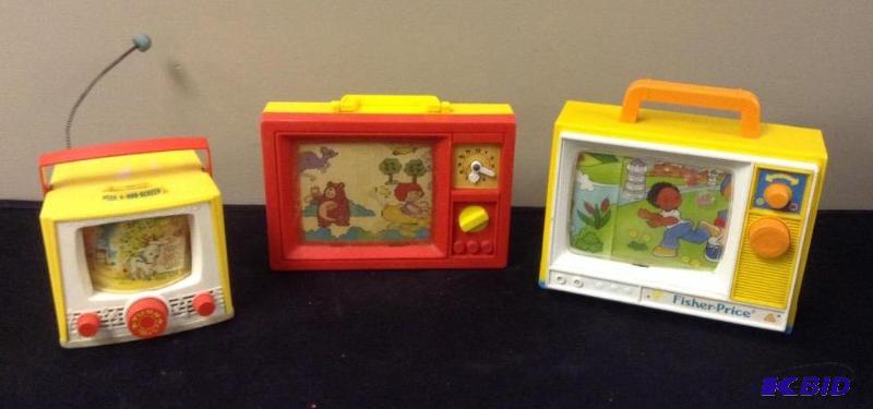 lot 140 image: Three Vintage Toy Musical Wind-ups with Moving Screens