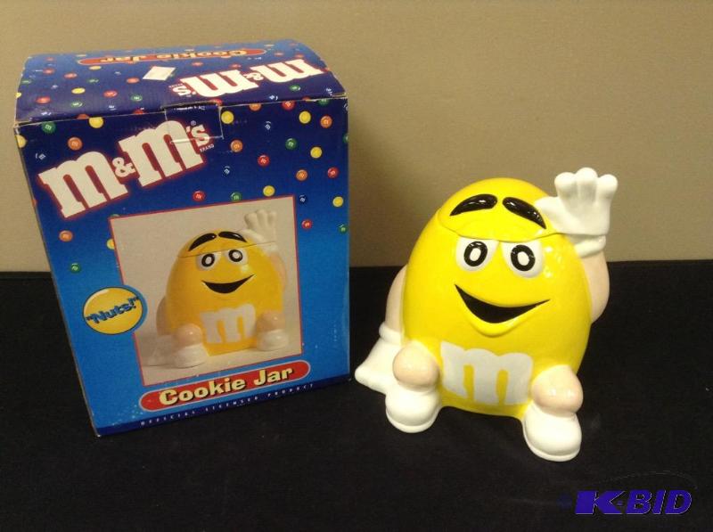 lot 27 image: Yellow M&M Cookie Jar