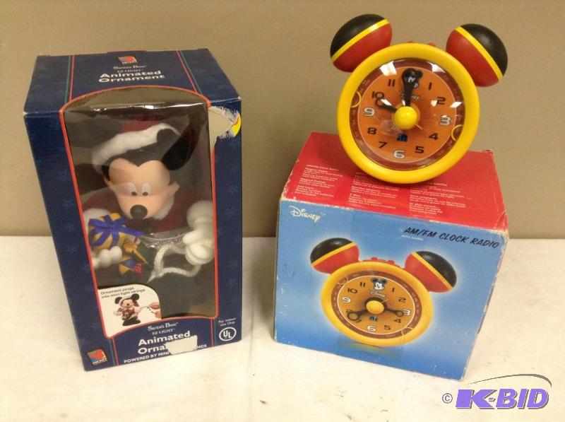 lot 35 image: Mickey Mouse Ornament & AMFM Clock Radio
