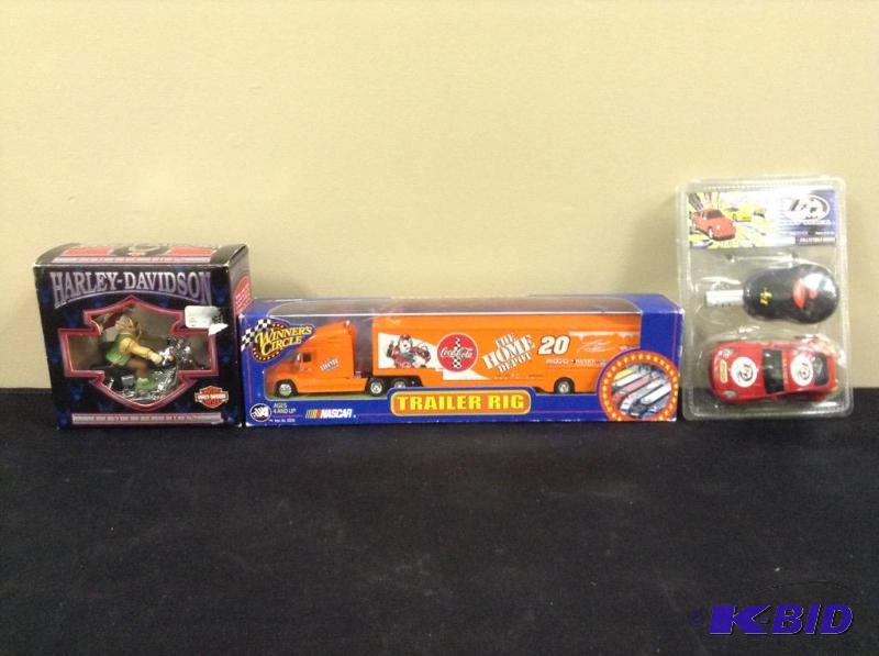 lot 93 image: Lot of Nascar trailer rig, Harley Davidson ornament and remote control car