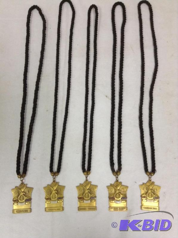 lot 94 image: Lot of five F.O.E. metals