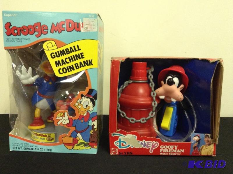 lot 19 image: Disney Toys Gumball Machine and Water Game