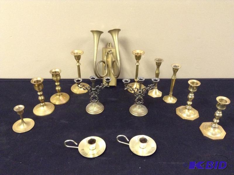 lot 19 image: Light Up Your Life Brass Candle Stick Holders Collection