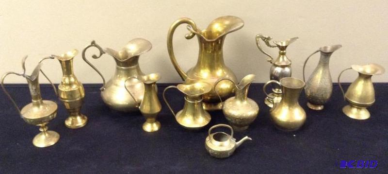 lot 31 image: Brass Pitchers of Varying Sizes and Shapes