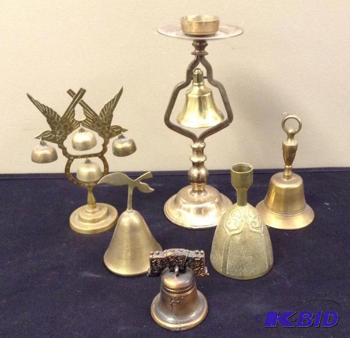lot 6 image: Brass Bells and Candle Holders